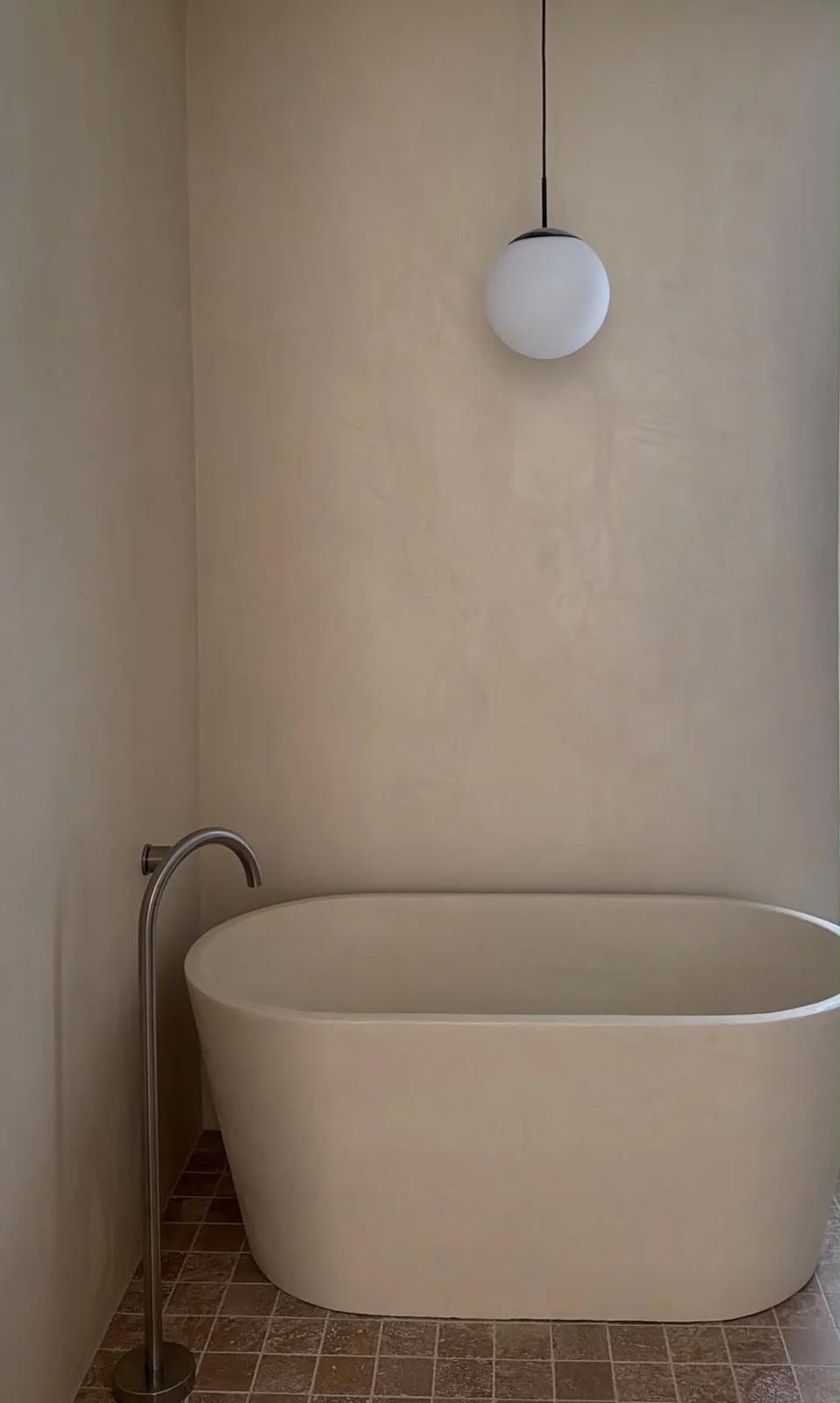 Finished microcement bathroom by Vila Finishes